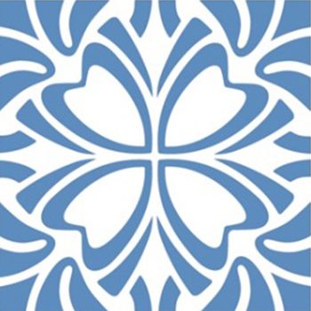 A blue and white tile with a floral design.